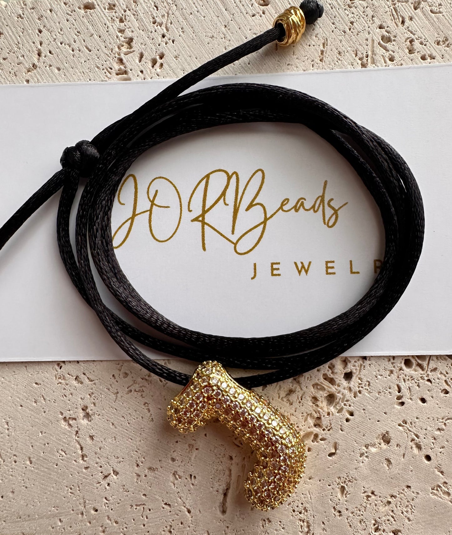 Inicial de Luz Brillosa